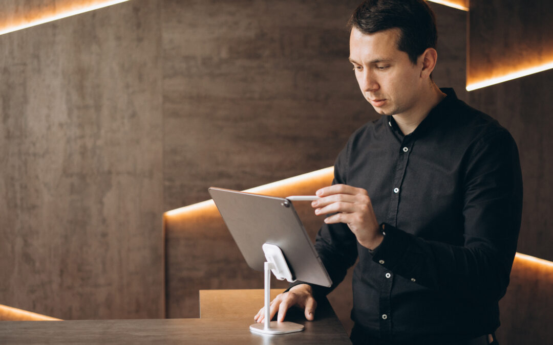 Modern hotel staff with tablet digital technology