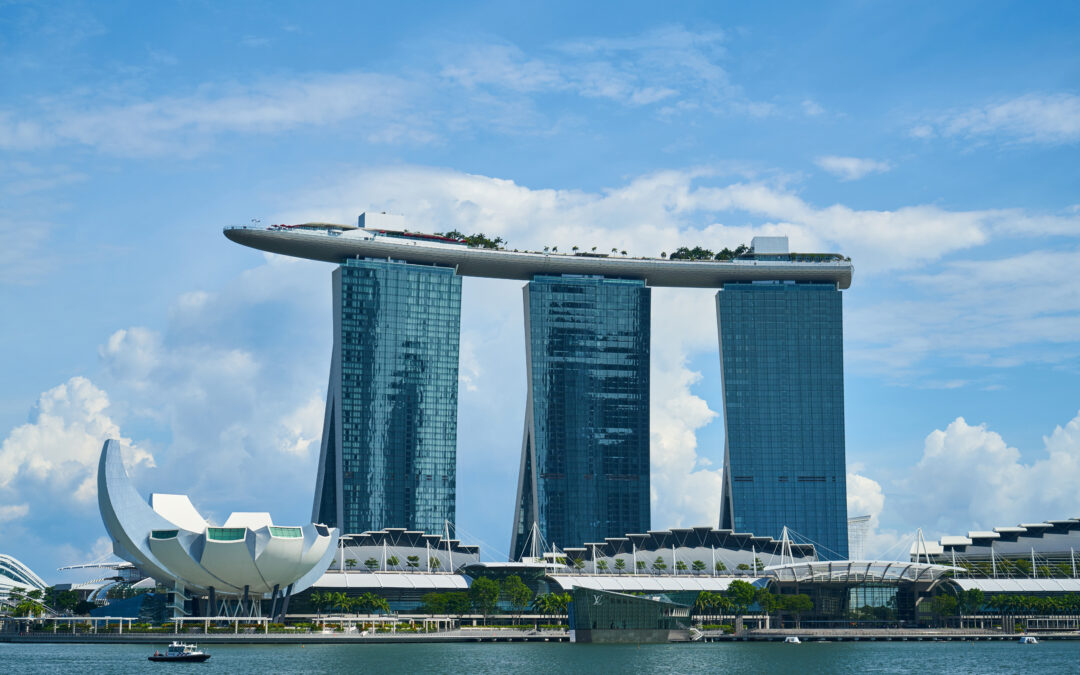 Panoramic exterior view of Marina Bay Sands hotel towers and skyline in Singapore